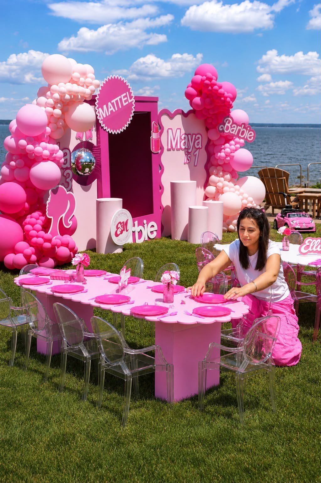 Estie, founder of Mini Chairs Atelier, styling a children's party table at an outdoor event