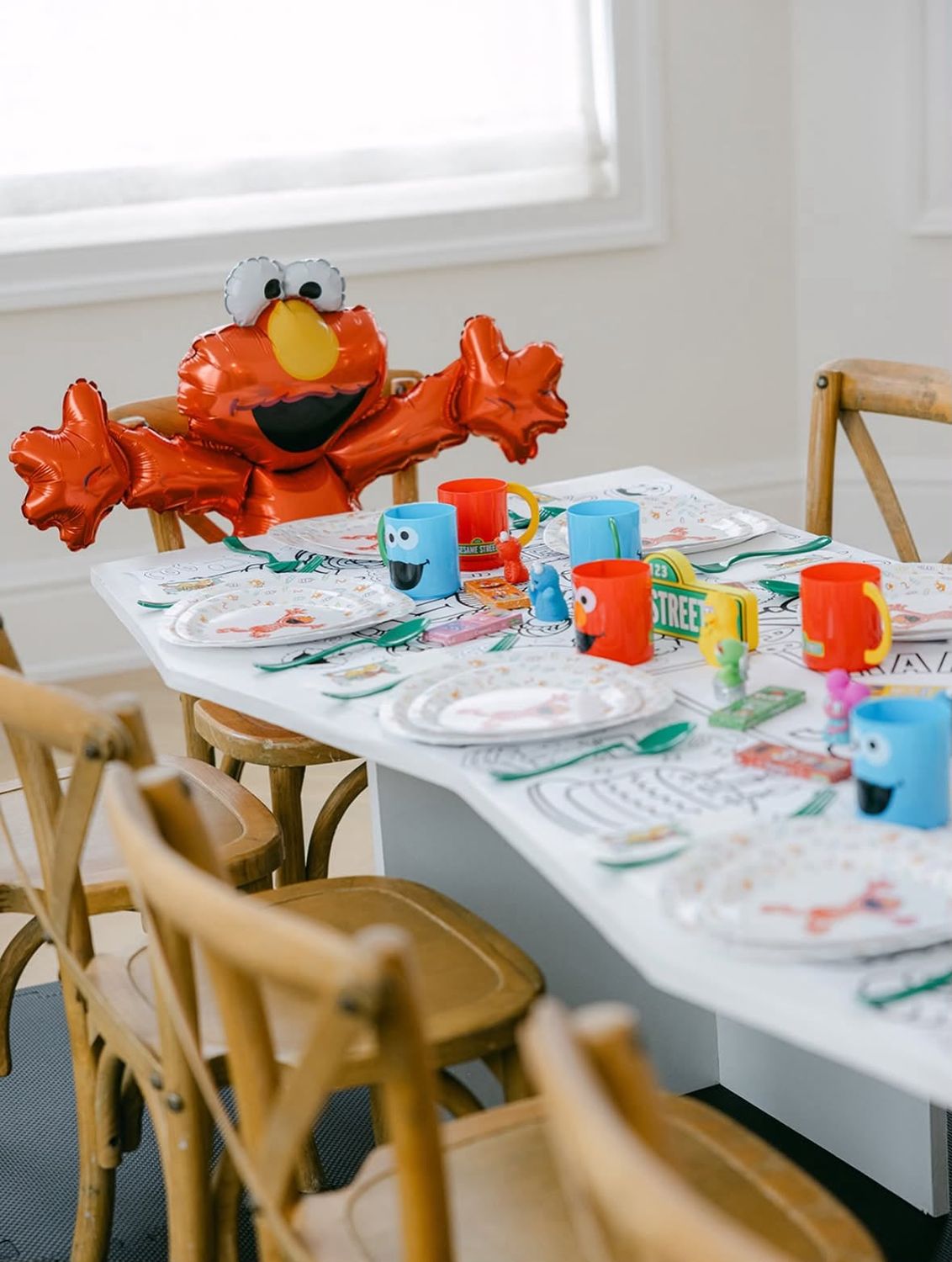 Bright character-themed children's table and rattan chairs
